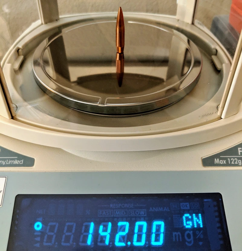 Sorting bullets by weight using an A&D FX-120i scale.