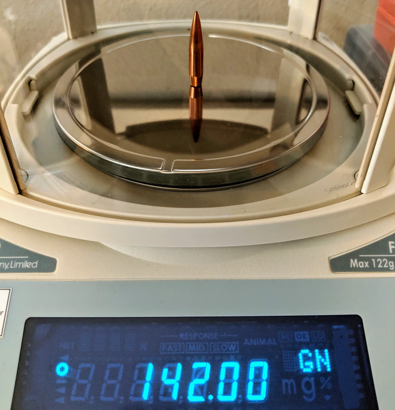 Sorting bullets by weight using an A&D FX-120i scale.