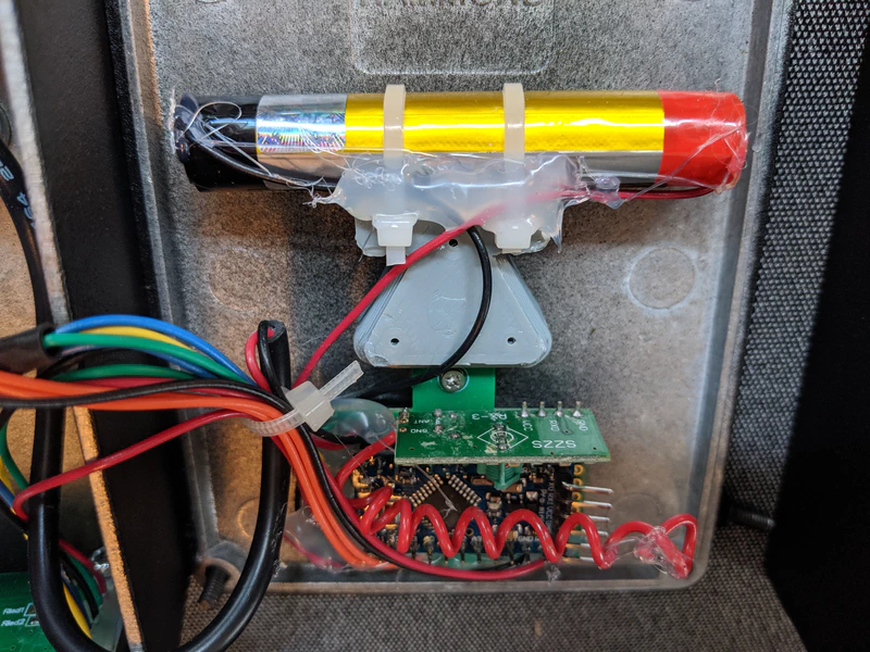 Inside the Two-Box Chrono, the battery is soldered and glued in place